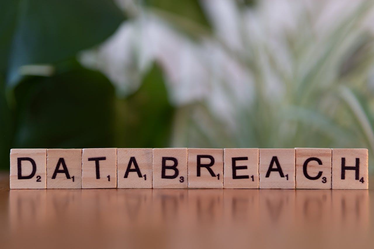 Crafting Captivating Headlines: Your awesome post title goes here Close-up of Scrabble tiles spelling 'data breach' on a blurred background